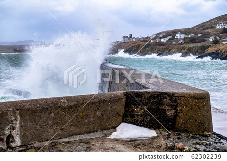 Crashing ocean waves in Portnoo during storm Ciara in County Donegal - Ireland 62302239