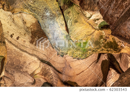 View inside the ancient cave with stone walls 62303543