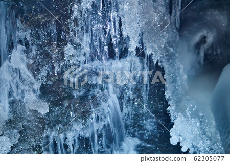 flowing water under a melting glacier 62305077