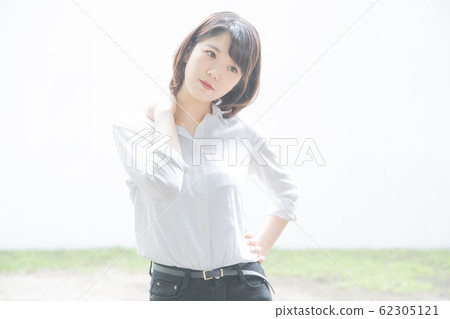 Young woman with stressed expression Young woman with stressed expression 62305121