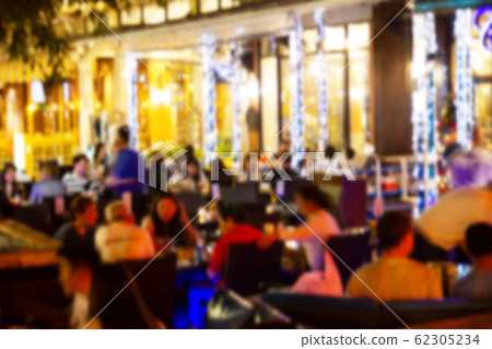 blurred image Lots of people enjoy at the bar pub blurred image Lots of people enjoy at the bar pub 62305234