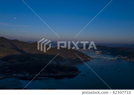 Sea town in Fukuyama city sunrise and moon Sea town in Fukuyama city sunrise and moon 62307718