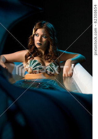 Sexy girl in beautiful bra sitting in bath 62308654