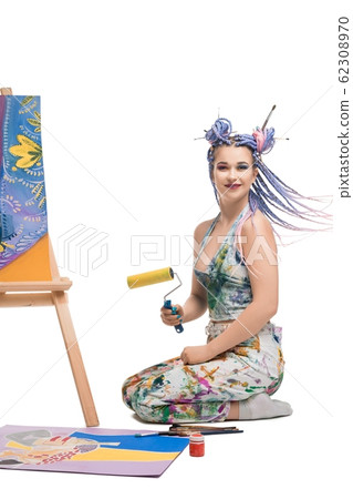 Sexy girl in sportswear sitting near easel shot 62308970