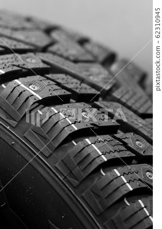 Fragment of a car studded tire Fragment of a car studded tire 62310945