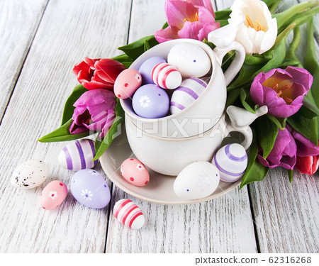 Easter eggs and tulips 62316268