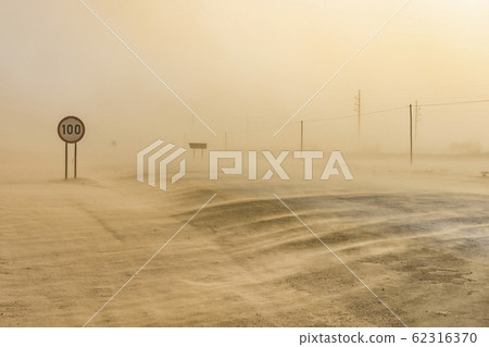 Sandstorm near Swakopmund in Namibia in Africa. 62316370