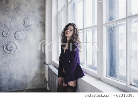 sexy girl in a jacket and stockings sexy girl in a jacket and stockings 62316393