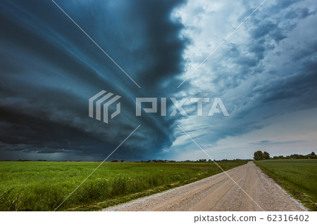 Storm clouds with shelf cloud and intense rain Storm clouds with shelf cloud and intense rain 62316402
