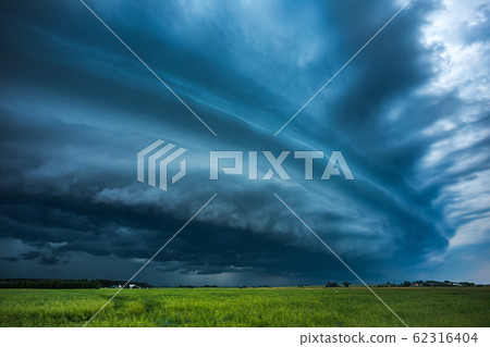 Storm clouds with shelf cloud and intense rain Storm clouds with shelf cloud and intense rain 62316404