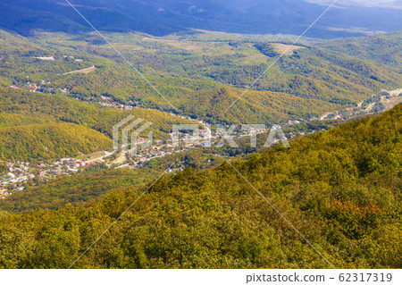 Houses in a mountain valley. 62317319