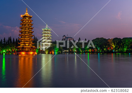 Sun and moon pagodas in Guilin at night Sun and moon pagodas in Guilin at night 62318082