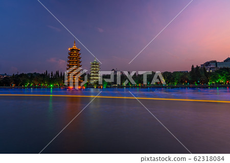 Sun and moon pagodas in Guilin at night 62318084