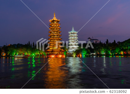 Sun and moon pagodas in Guilin at night 62318092