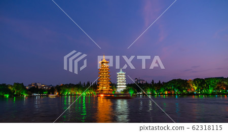 Sun and moon pagodas in Guilin at night Sun and moon pagodas in Guilin at night 62318115