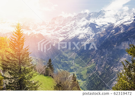 Beautiful mountain landscape with snowy peaks 62319472