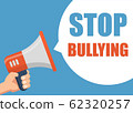 Stop Bullying - Male hand holding megaphone. Flat 62320257