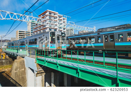 Local train running through the city of Matsumoto: Oito Line Matsumoto Local train running through the city of Matsumoto: Oito Line Matsumoto 62320953
