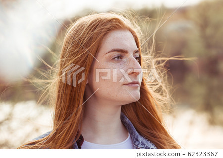 Girl with freckles Girl with freckles 62323367