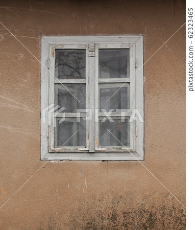 Close view old white wooden window on 62323465