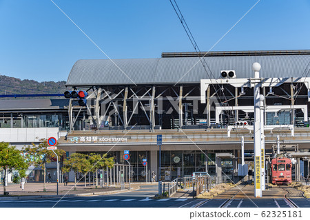 Kochi City, Kochi Prefecture JR Kochi Station South Exit and Tosa Electric Railway (Tosaden) train on a sunny day 62325181