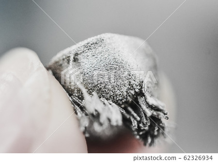 Small object printed on metal 3d printer macro. Small object printed on metal 3d printer macro. 62326934