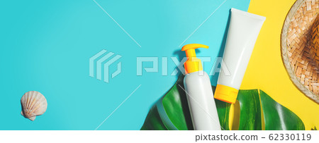 Sunprotection objects, suscreen. Prevention of photoaging. Flat lay, natural cosmetics SPF for face and body. Summer Travel Vacation Concept Banner 62330119