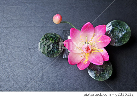 lotus flower dark leather background lotus flower dark leather background 62330132