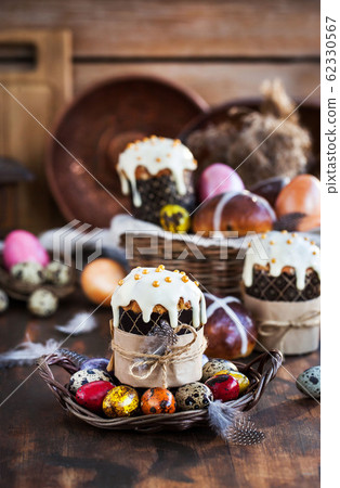 Holiday Easter cakes, hot cross buns and colorful Holiday Easter cakes, hot cross buns and colorful 62330567