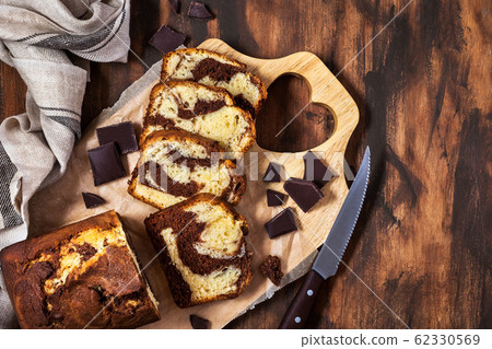 Delicious homemade marble pound cake on wooden Delicious homemade marble pound cake on wooden 62330569