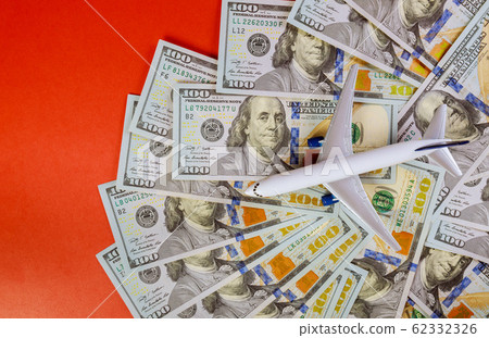 Model of airplane on a american dollars banknotes. Model of airplane on a american dollars banknotes. 62332326