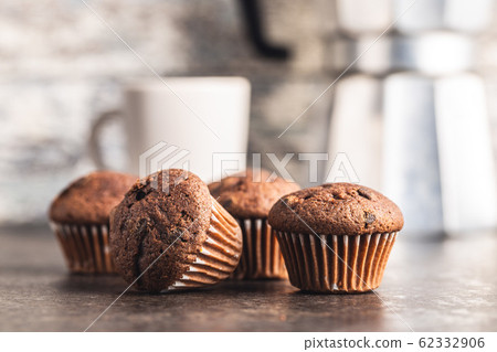 Tasty chocolate muffins. Sweet cupcakes. 62332906