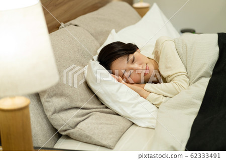 Middle women sleep bedroom bedroom lifestyle image 62333491