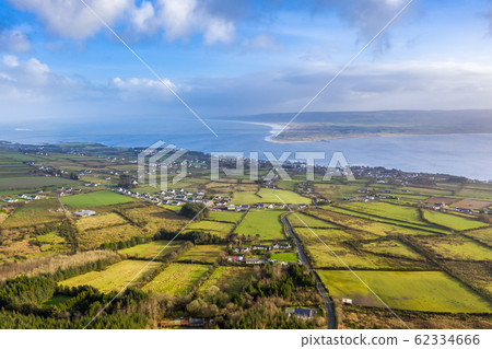 Aerial view of Greencastle, Lough Foyle and Magilligan Point in Northern Ireland - County Donegal, Ireland Aerial view of Greencastle, Lough Foyle and Magilligan Point in Northern Ireland - County Donegal, Ireland 62334666
