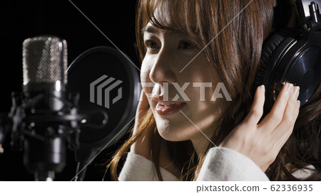 Woman recording vocals Woman recording vocals 62336935