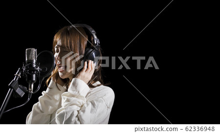 Woman recording vocals Woman recording vocals 62336948