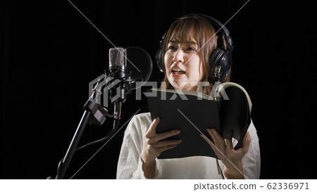 Young woman dubbing Young woman dubbing 62336971