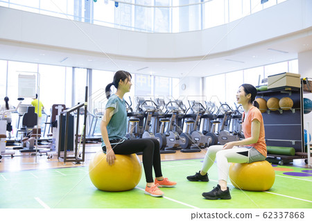 Woman gym training diet exercise balance ball Woman gym training diet exercise balance ball 62337868