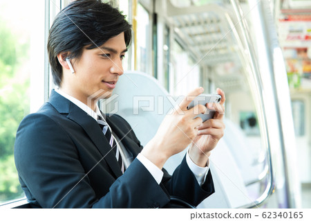 Commuter male train businessman shooting cooperation: Keio Electric Railway Co., Ltd. 62340165