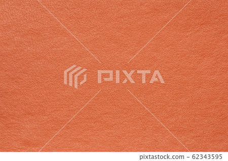 Synthetic orange leather for background. Close-up texture decoration material Synthetic orange leather for background. Close-up texture decoration material 62343595
