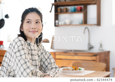 Female lifestyle kitchen 62344474