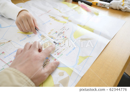 Family members checking evacuation routes Family members checking evacuation routes 62344776
