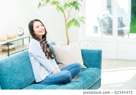 young woman      62345475