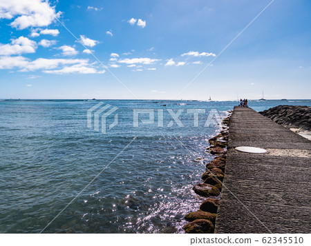 The breakwater and ocean at Waikiki Beach, Oahu, Hawaii The breakwater and ocean at Waikiki Beach, Oahu, Hawaii 62345510
