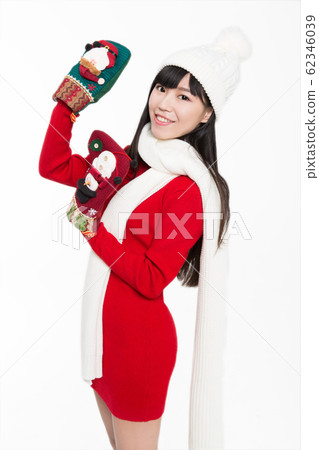 pretty woman holding christmas stockings pretty woman holding christmas stockings 62346039