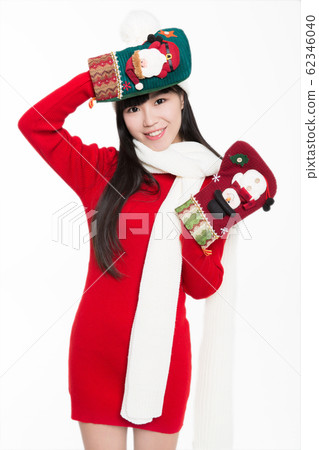 pretty woman holding christmas stockings pretty woman holding christmas stockings 62346040