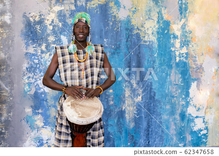 Portrait of handsome african musician with Djembe drum 62347658