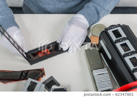 technician scan a negative film technician scan a negative film 62347801