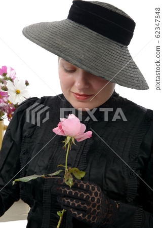 young woman in  vintage costume 1900s 62347848