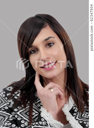 portrait of a beautiful young brunette woman on portrait of a beautiful young brunette woman on 62347934